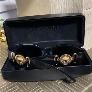 Versace Black “Biggie” shades. Beautifully used
